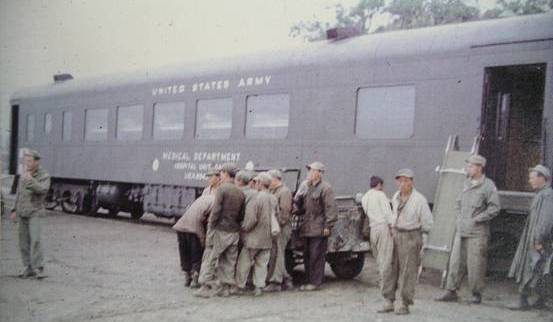 Soldiers outside hospital car